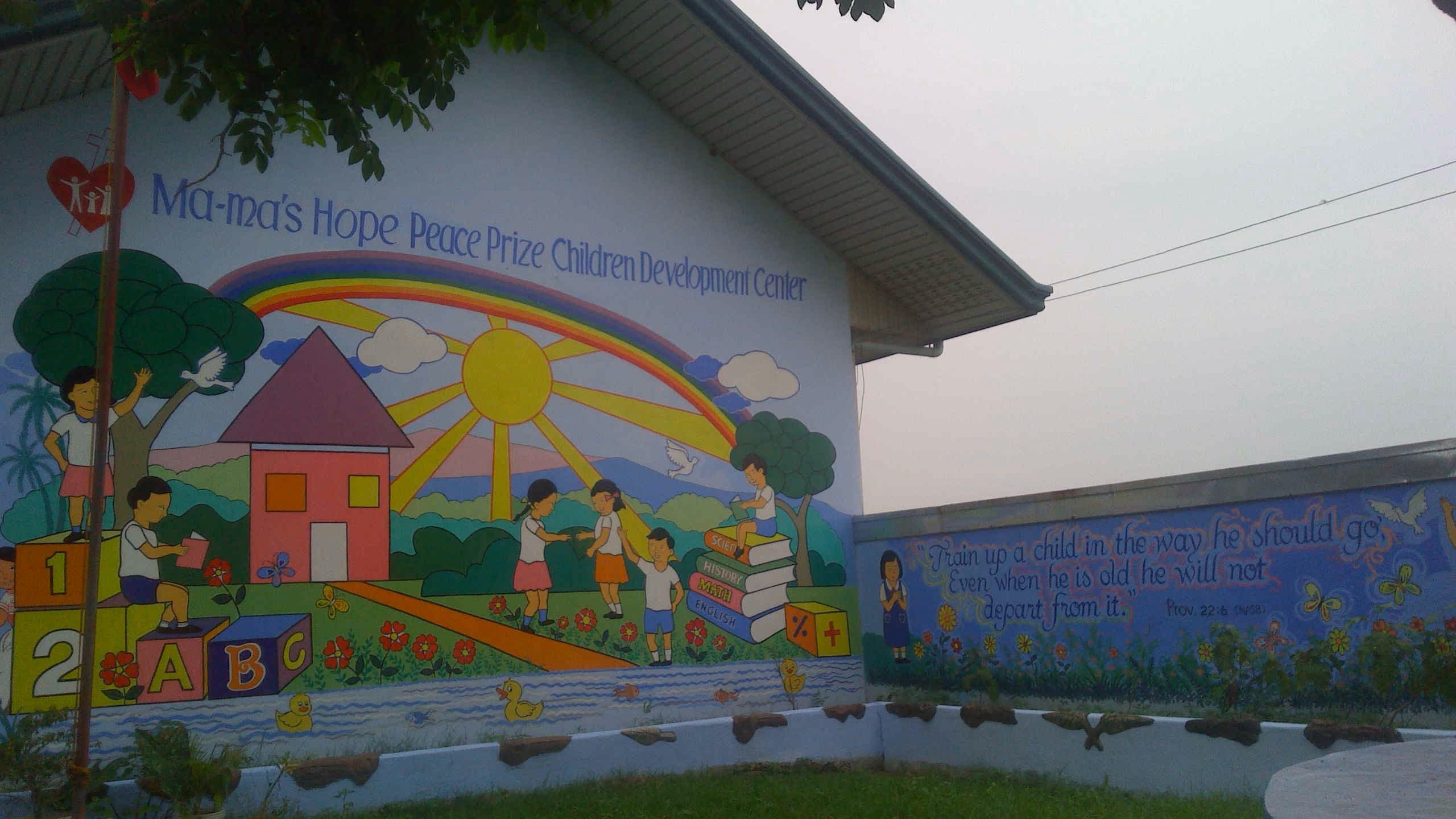 Veggmaleri ved Mama's Hope Peace Prize Children Development Center.